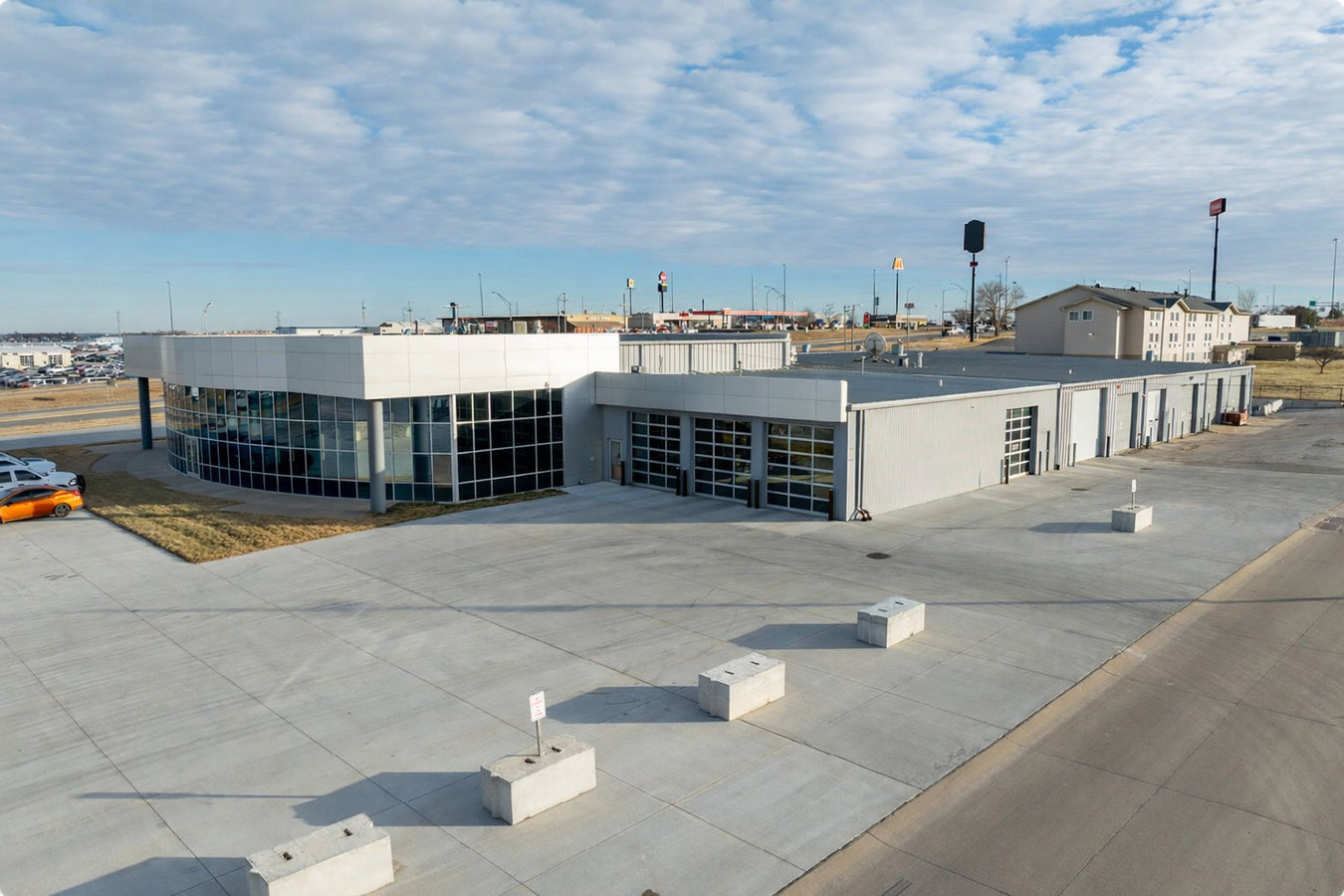 Concrete parking lot building